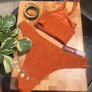 Lalani Kini in Burnt Orange